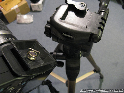 Screwing on the camera base.