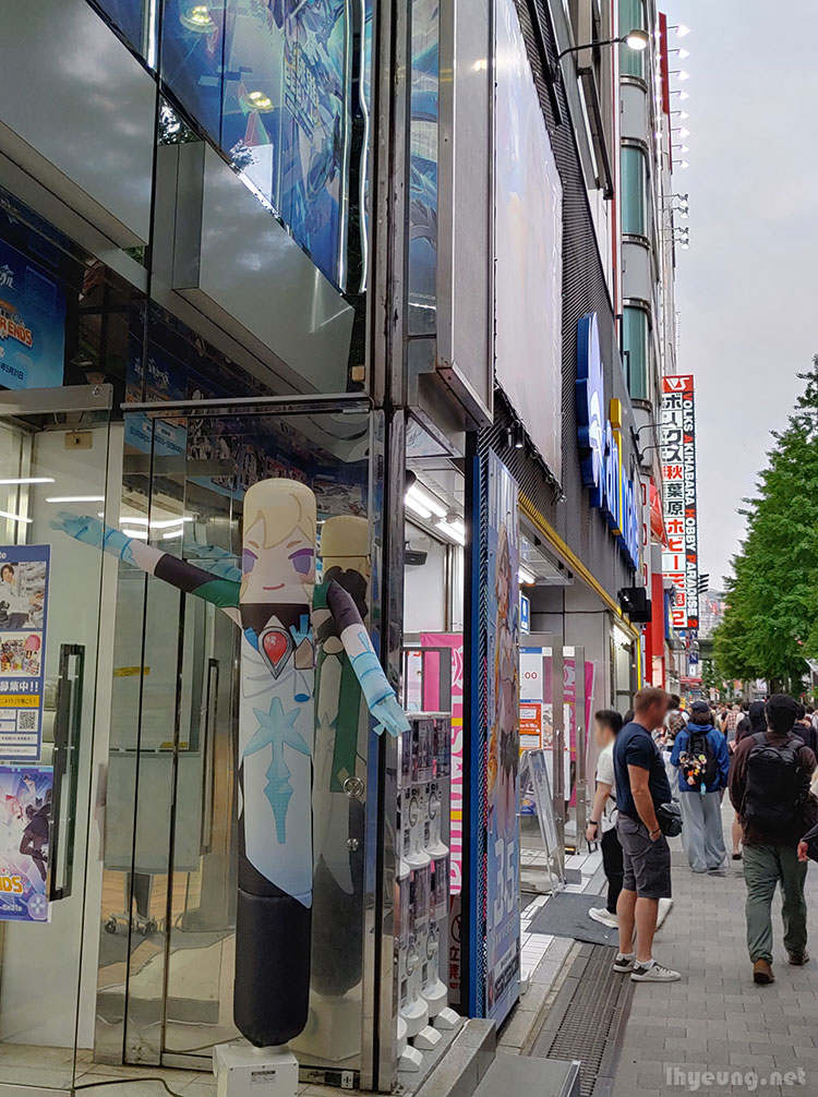 Akiba girl waves hi. Akiba girl waves hi.