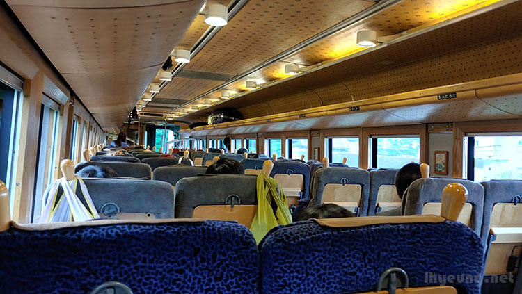 Nice pics decorates the old wooden carriage interior.