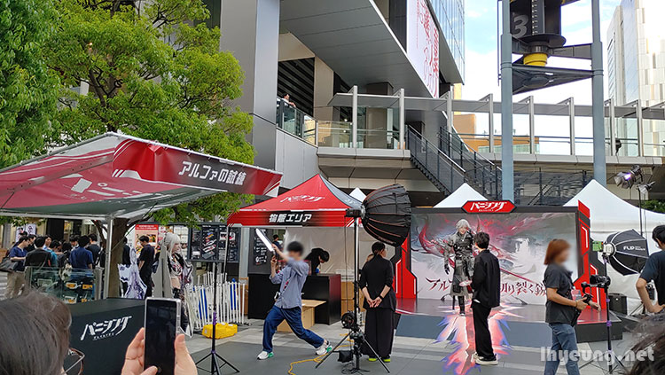 Punishing Grey Raven promo event with cosplayers.